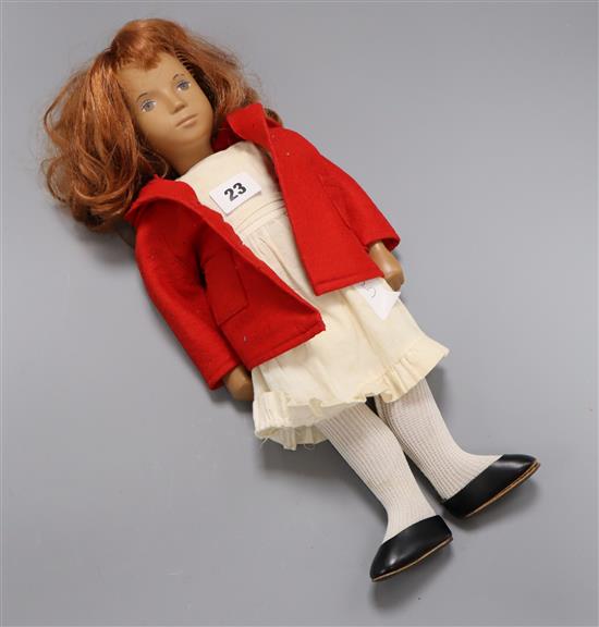 An Angela red bowed vintage Sasha doll
